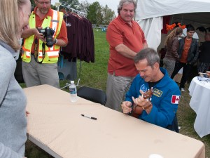 Chris Hadfield playing ukulele.